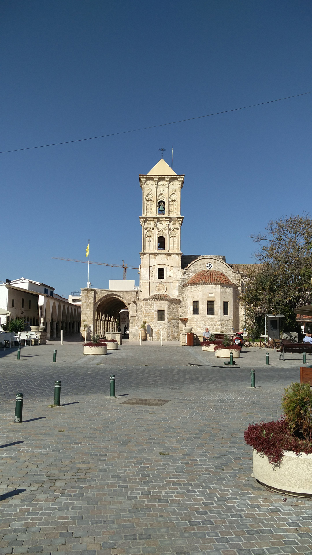 white church in a square in Cyprus