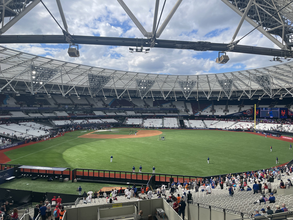 London Stadium redesigned to be a baseball diamond with baseball players warming up