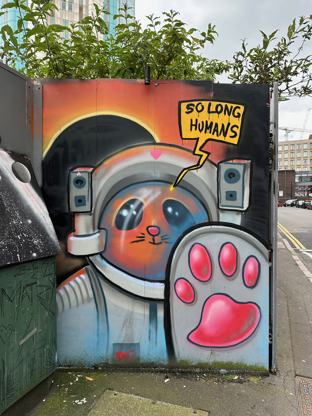 Street art depicting stylised cat astronaut with 