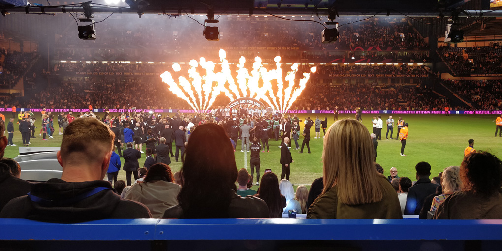 Flames shoot into the air as the winners of Sovccer Aid 2024 receive their trophy at Stamford Bridge