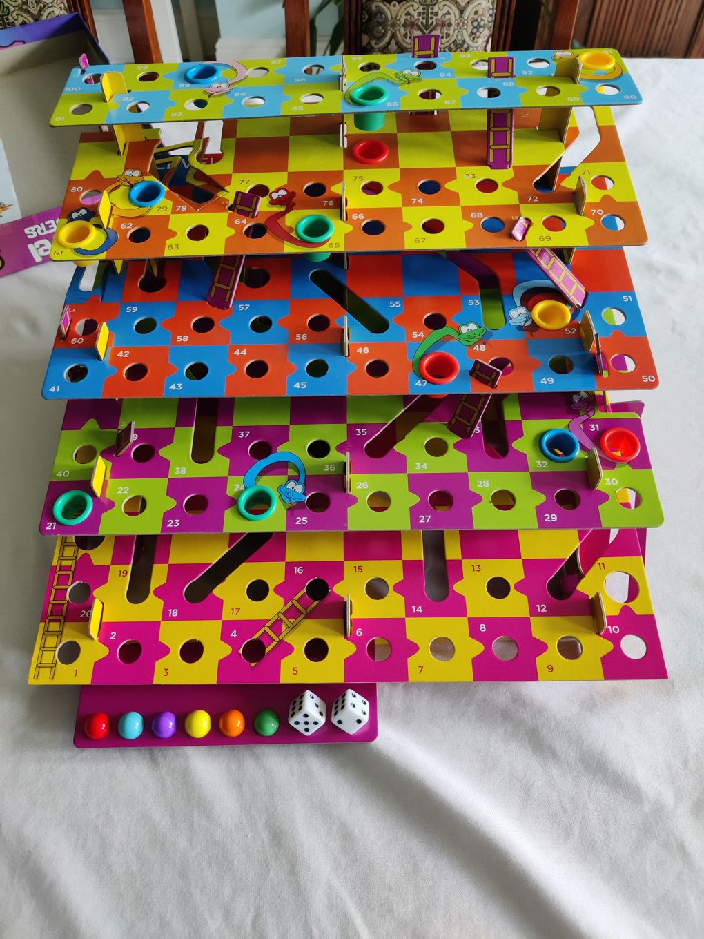 A colourful multi-level board game of snakes and ladders