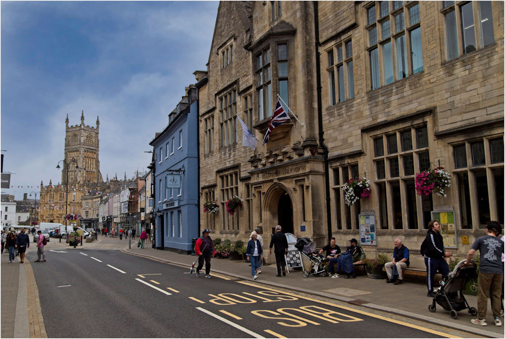 A view of modern day Cirencester showing the buildings that used to be pubs .