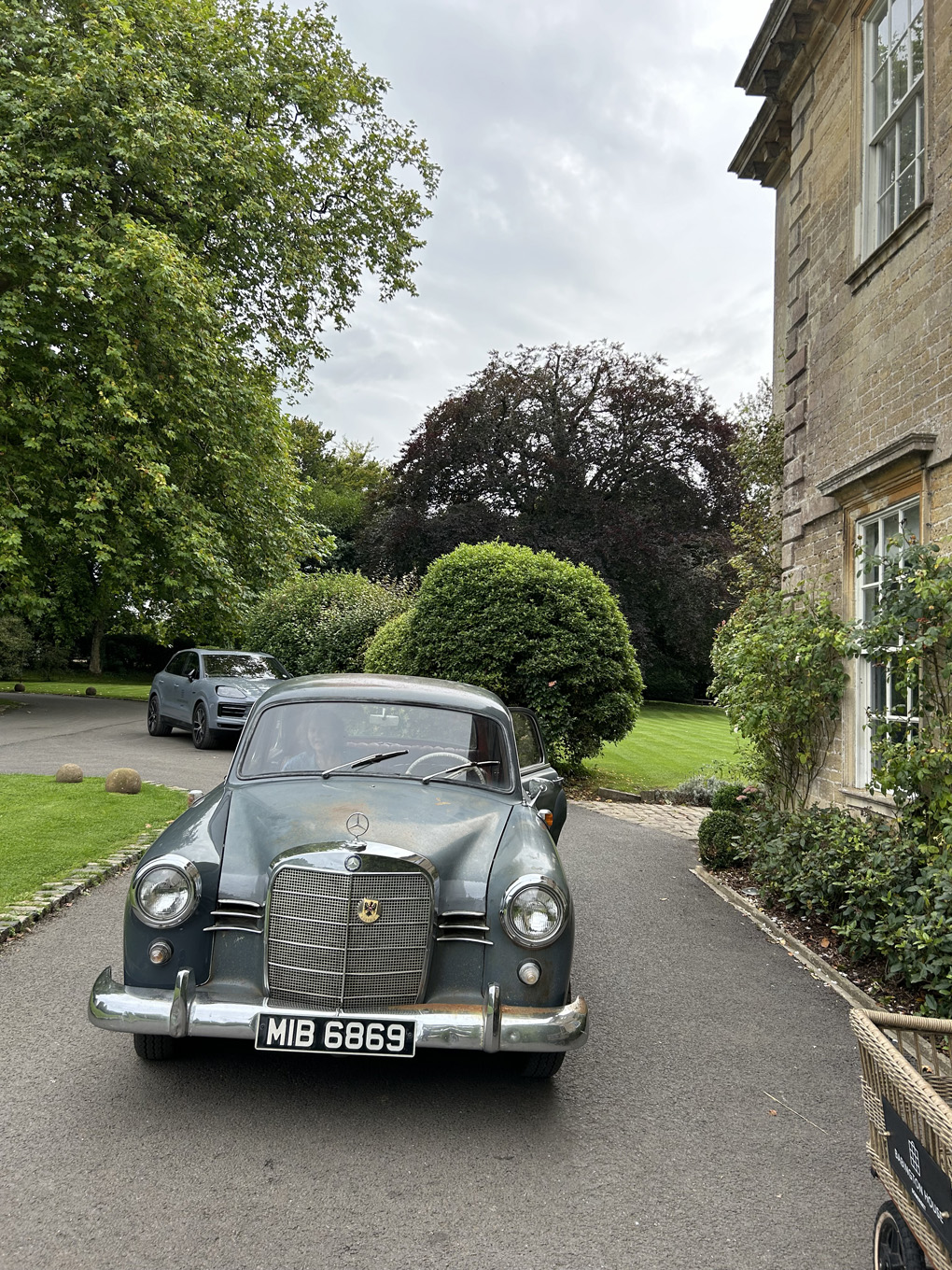 Vintage Mercedes sitting outside a Georgian building