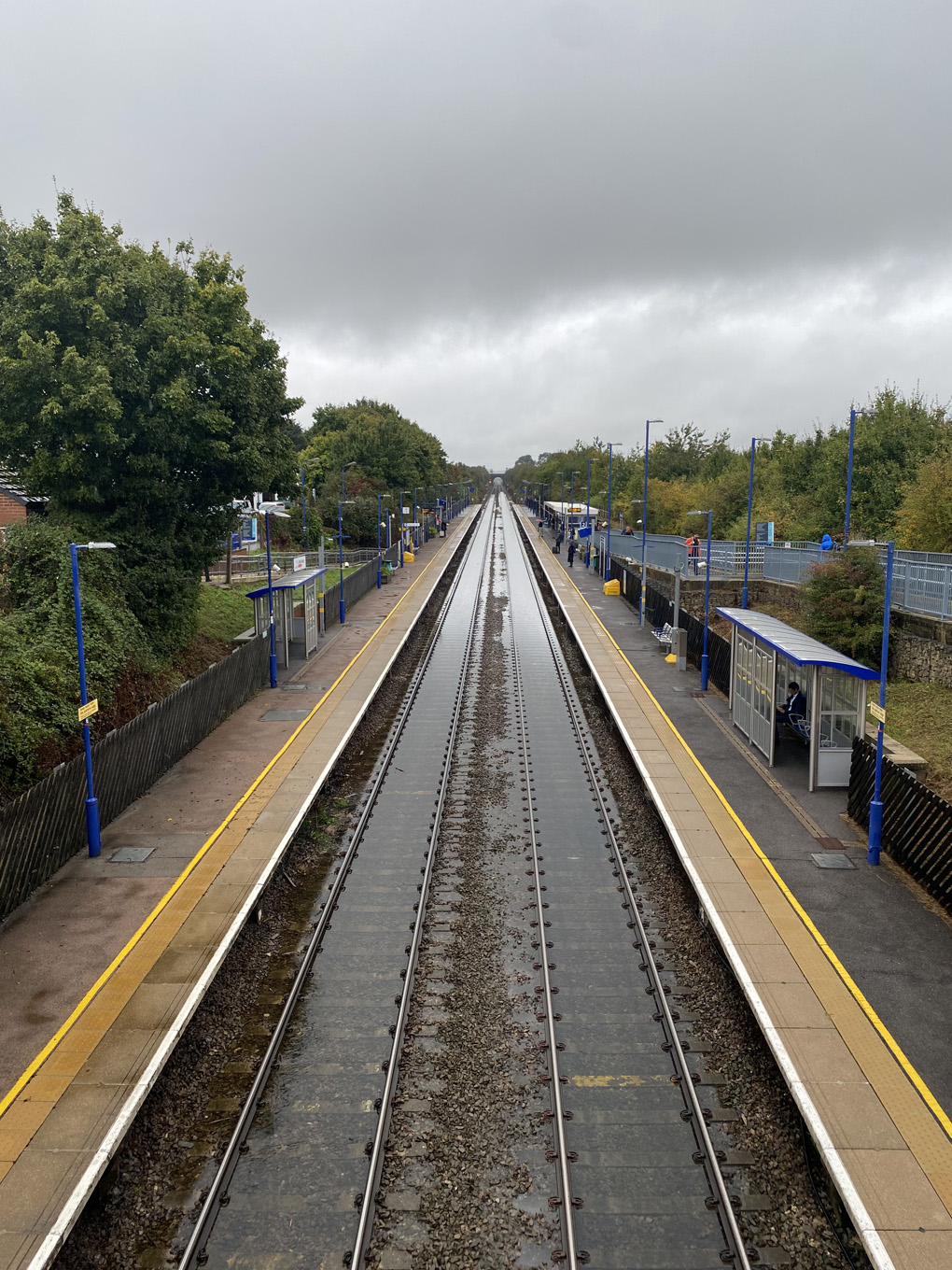 A view along a railway flooded track