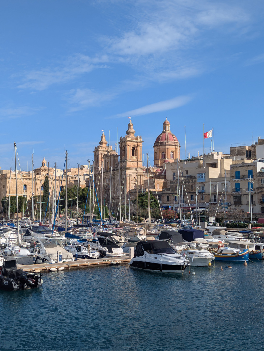 View of the waterfront harbour on a clear blue sky day in October