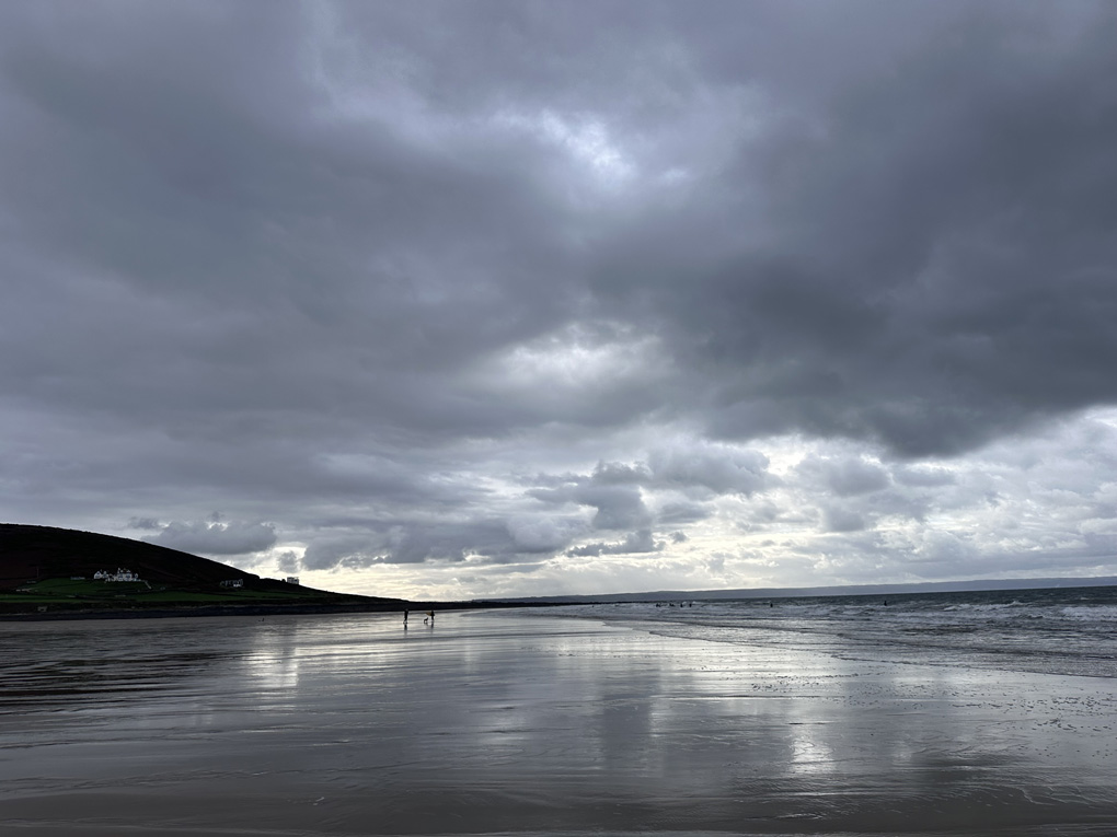 Grey clouds over beach