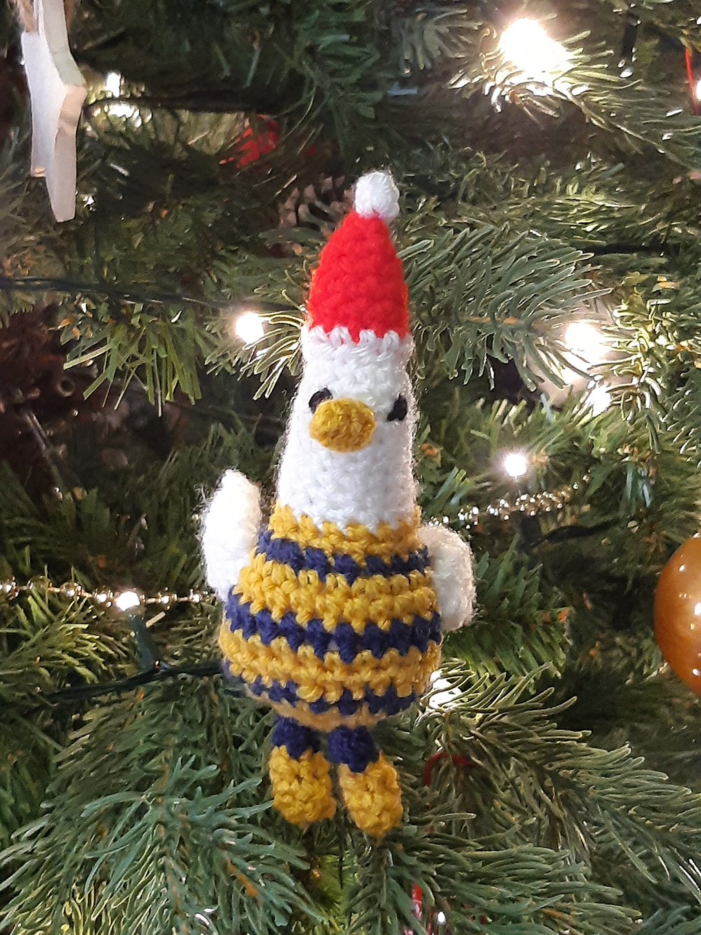 Picture of a crochet Christmas tree decoration.