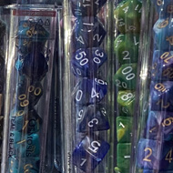 A display of sets of dice in test tubes
