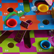 A colourful multi-level board game of snakes and ladders