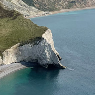 Chalk cliff coves and crystal blue sea