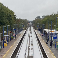 A view along a railway flooded track