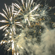 Firework exploding over a crowd