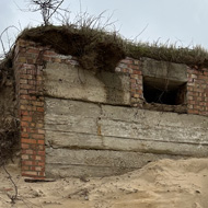 WW2 coastal defenses revealed by high tides on North Norfolk beach