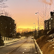 Cycle lane the setting sun in the horizon.