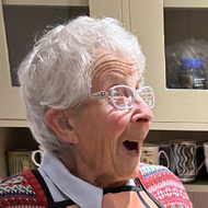 92 year old lady looking surprised and happy