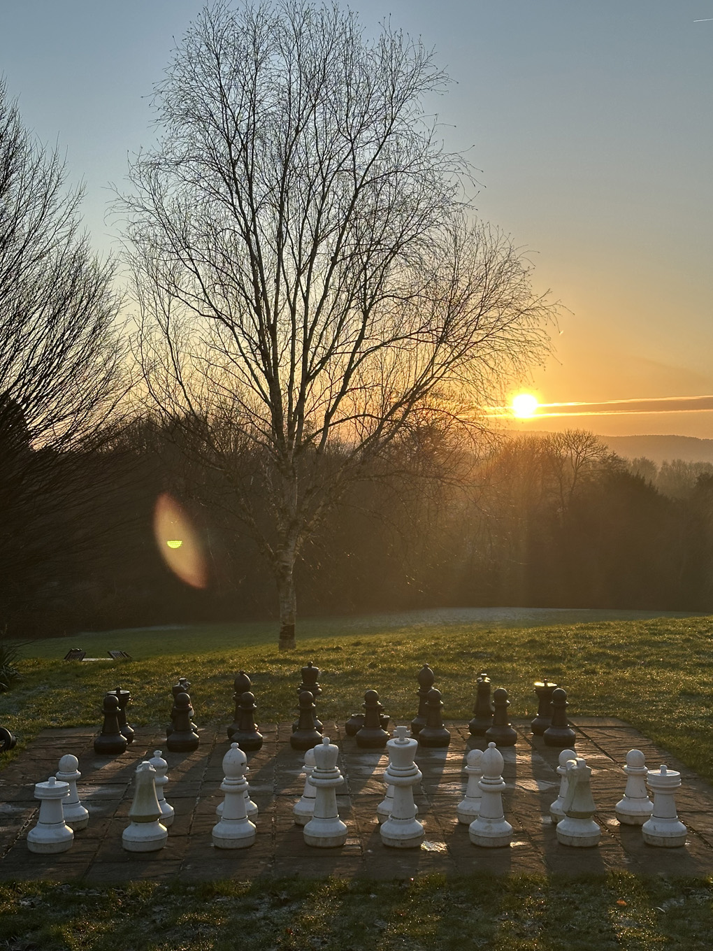 we see an outdoor chessboard in the grounds of Hartsfield Manor, Betchworth