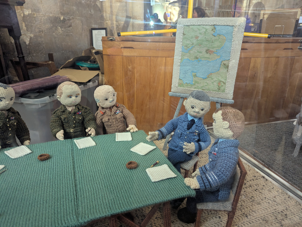 Woollen dolls of military leaders planning the invasion of Europe