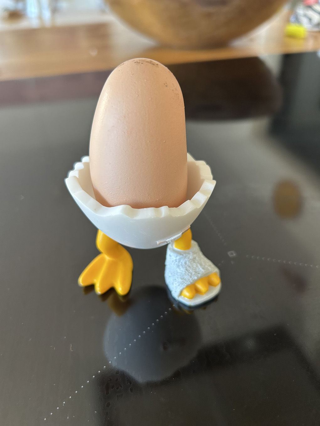 Elongated egg in an egg cup